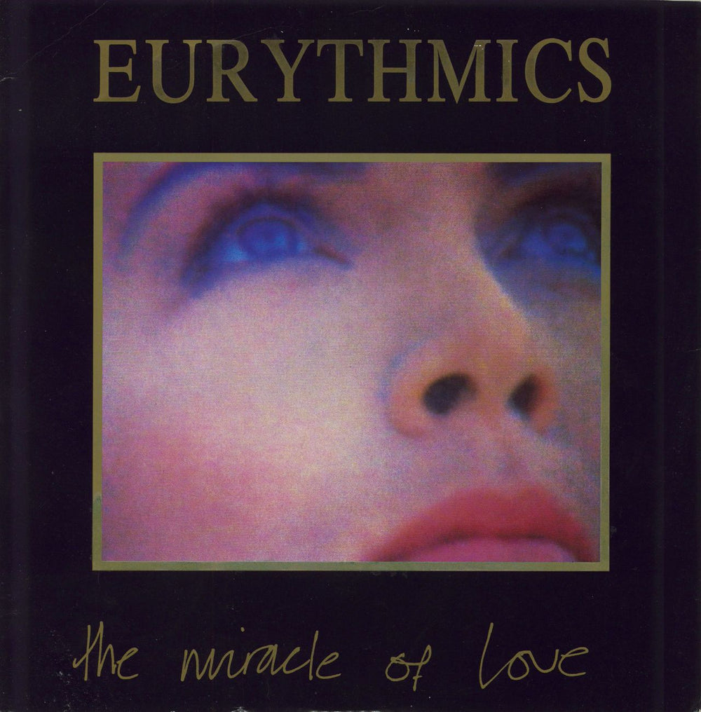 Eurythmics The Miracle Of Love UK 12" vinyl single (12 inch record / Maxi-single) DAT9