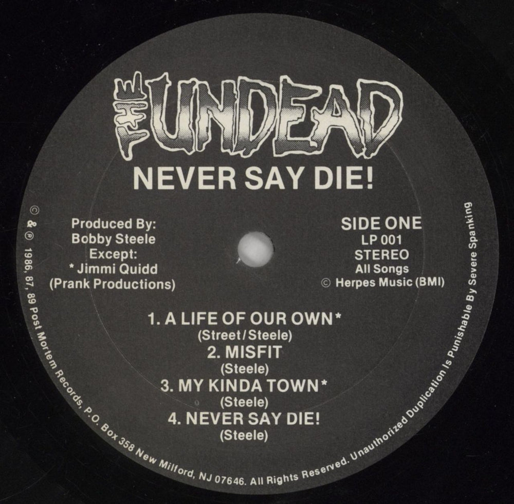 The Undead Never Say Die! US vinyl LP album (LP record) 31LLPNE863165