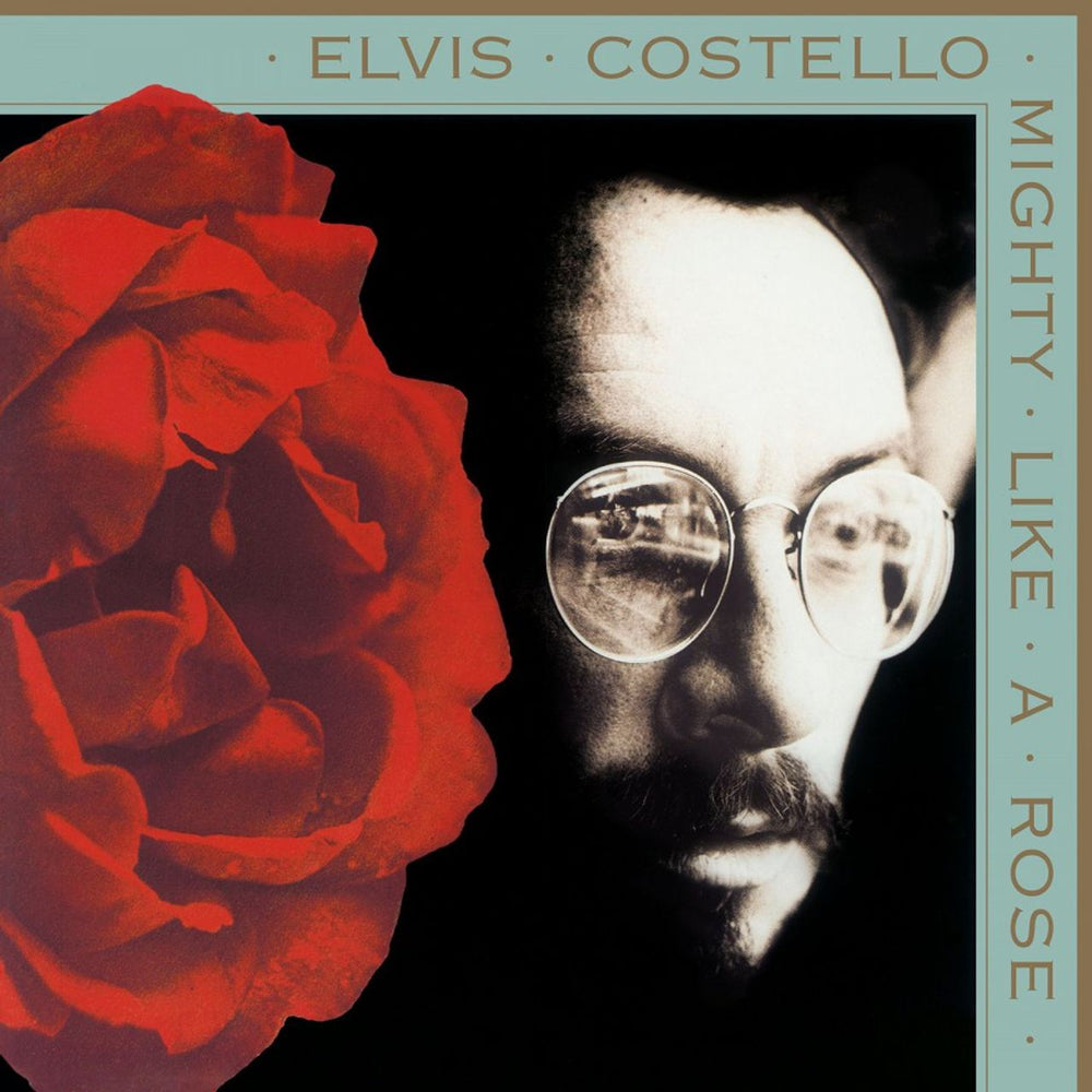 Elvis Costello Mighty Like A Rose - Gold Vinyl UK vinyl LP album (LP record) COSLPMI794087