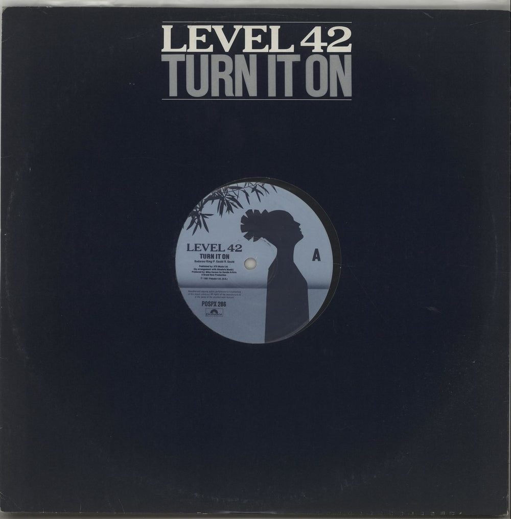 Level 42 Turn It On UK 12" vinyl single (12 inch record / Maxi-single) POSPX286