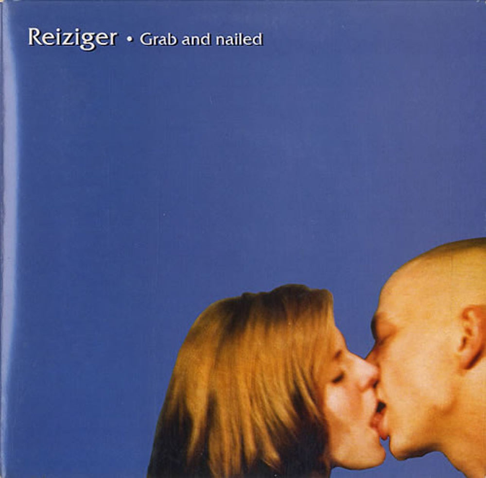 Reiziger Grab And Nailed - Orange Vinyl Czech 7" vinyl single (7 inch record / 45) DAY26