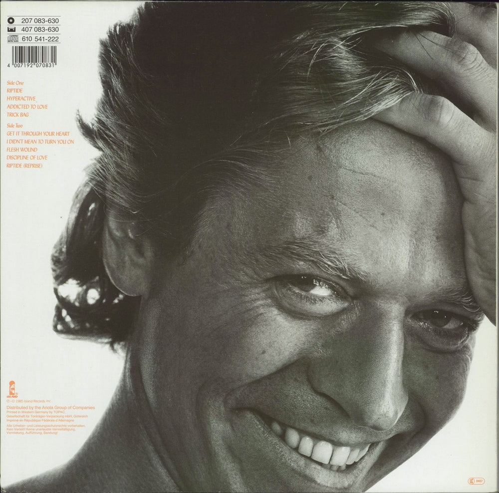 Robert Palmer Riptide - Stickered sleeve German vinyl LP album (LP record) 4007192070831