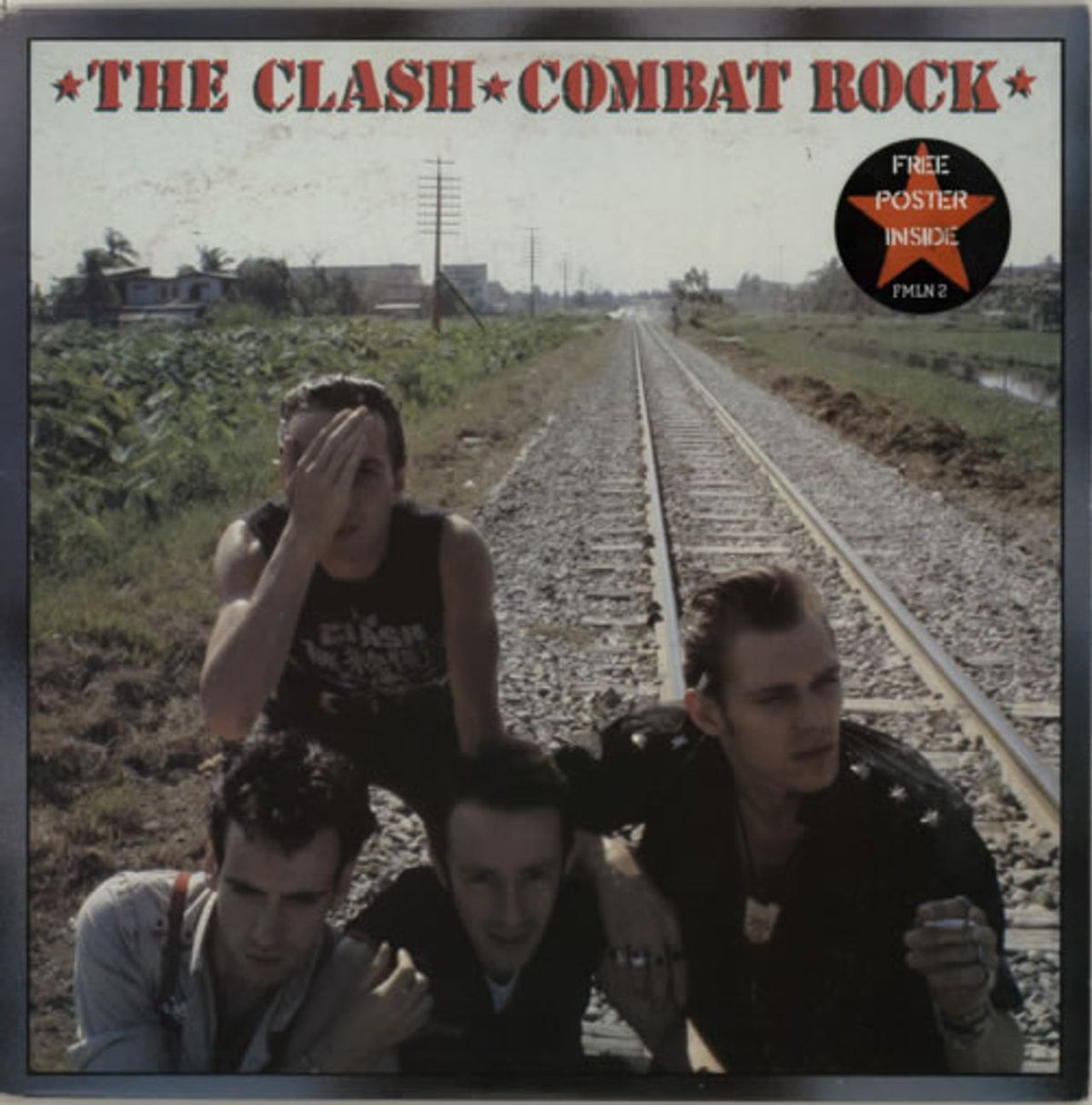 The Clash Combat Rock + Poster UK Vinyl LP — RareVinyl.com