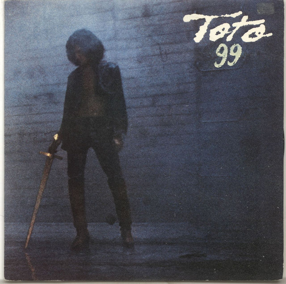 Toto 99 (Ninety-Nine) Spanish Promo 7" vinyl single (7 inch record / 45) CBS8132